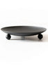 Black wrought-iron trivet and candle holder displayed as a compact tabletop accessory.