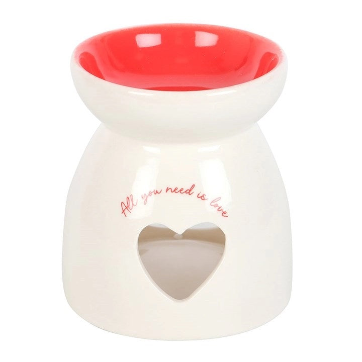 Valentine's Day Heart Oil Burner and Wax Warmer in white ceramic with red interior and heart cutout design.