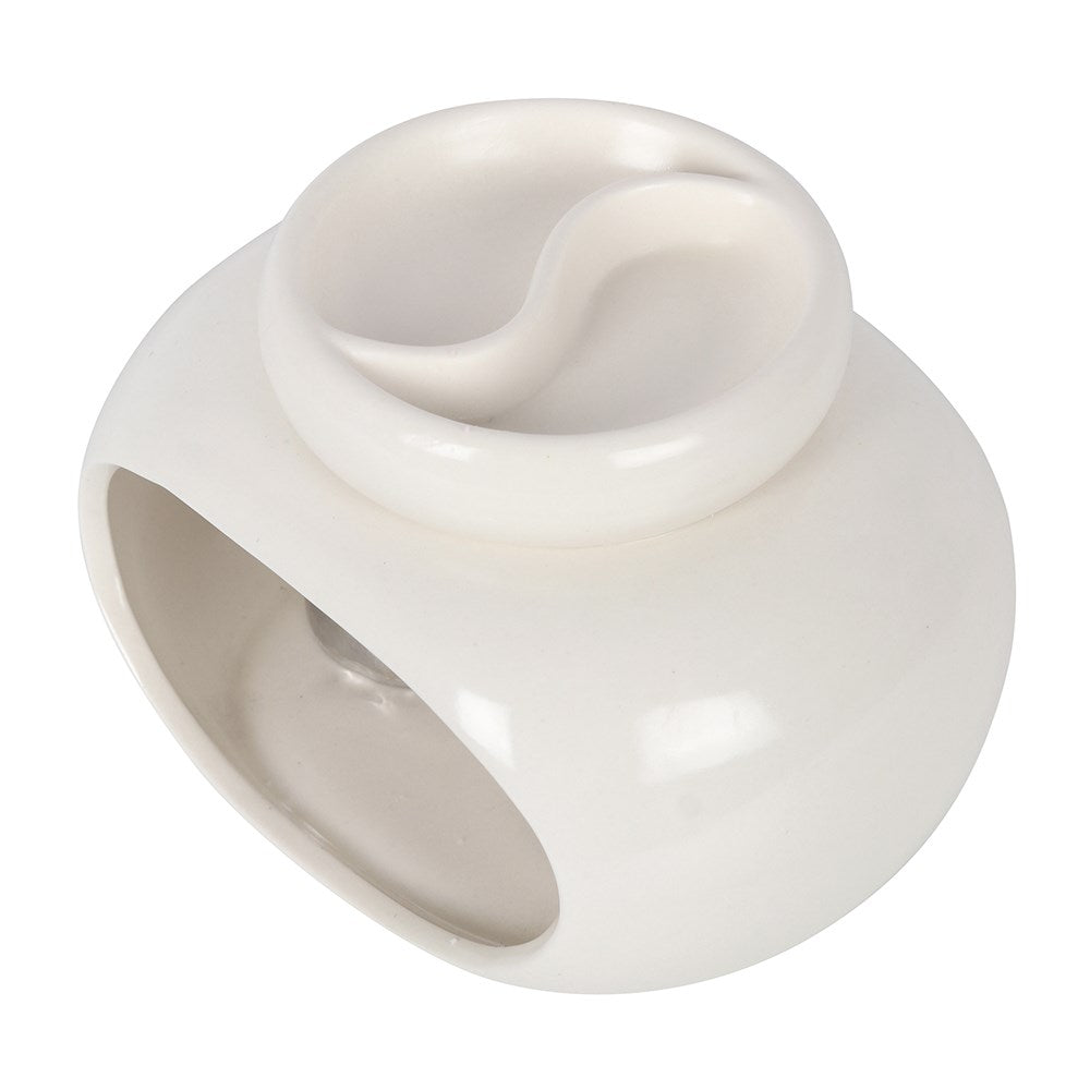 Glossy white ceramic double-bowl wax warmer with round hollow base, arched front opening and two top wells separated by an S-shaped divider.